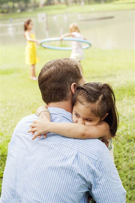 father and daughter hugging